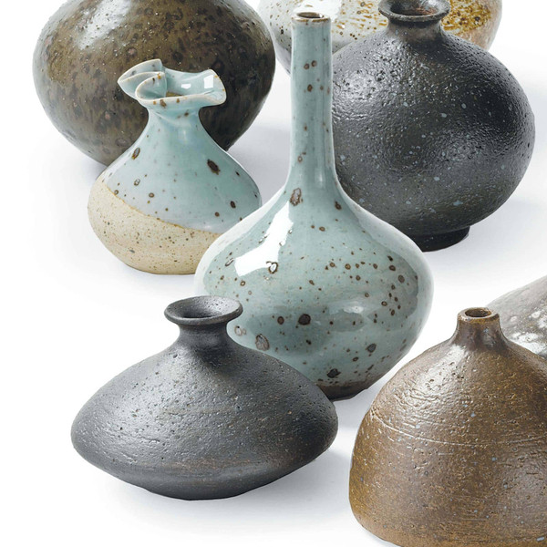 porcelain bud vases in varying colors and textures
